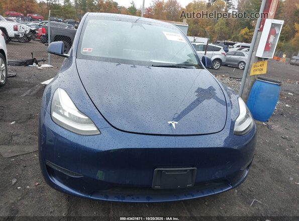 7SAYGDEE6NA017534 2022 TESLA MODEL Y Blue Սալոնի հետևի տեսք