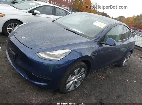 7SAYGDEE6NA017534 2022 TESLA MODEL Y Blue Առջևի ձախ երեք քառորդ տեսարան