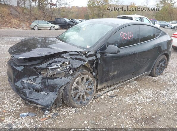 7SAYGDEE7PA168854 2023 TESLA MODEL Y Black Առջևի ձախ երեք քառորդ տեսարան