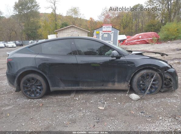 7SAYGDEE7PA168854 2023 TESLA MODEL Y Black Սալոնի հետևի տեսք