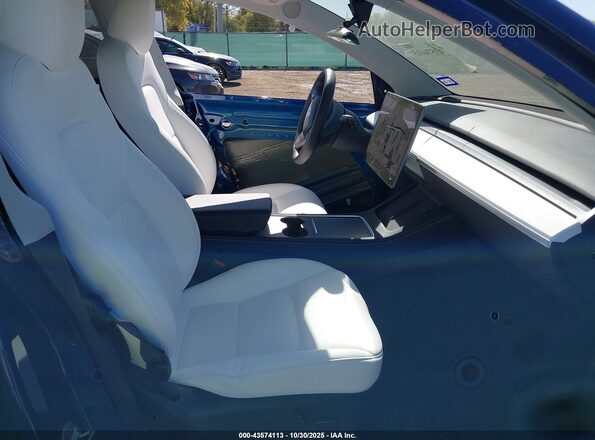 7SAYGDEE7RA323793 2024 TESLA MODEL Y Blue წინა სალონის ხედი