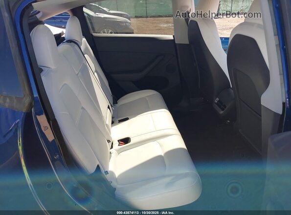 7SAYGDEE7RA323793 2024 TESLA MODEL Y Blue VIN კოდის სტიკერის ხედი