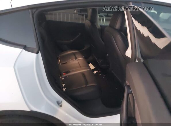 7SAYGDEE8NF357061 2022 TESLA MODEL Y White VIN კოდის სტიკერის ხედი
