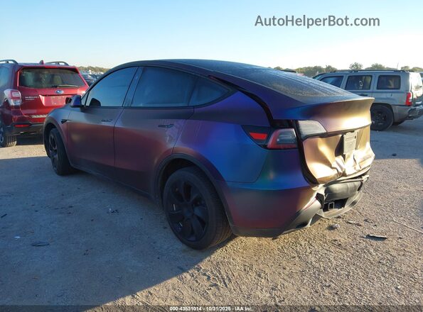 7SAYGDEE8RA232743 2024 TESLA MODEL Y Purple Trasero izquierdo