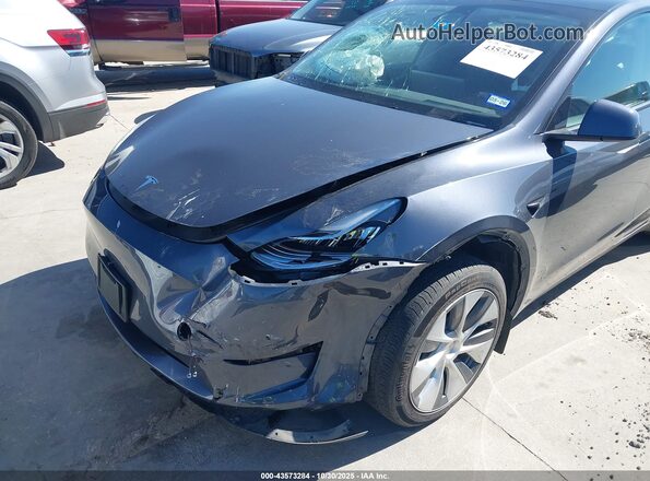7SAYGDEE9PA120577 2023 TESLA MODEL Y Gray Vista frontal