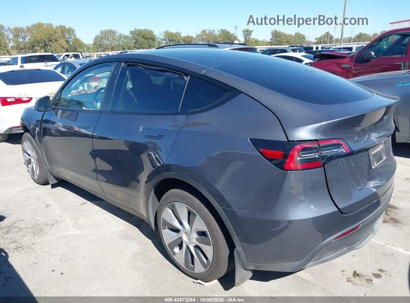 7SAYGDEE9PA120577 2023 TESLA MODEL Y Gray Trasero izquierdo