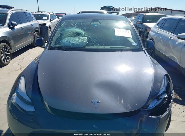 7SAYGDEE9PA120577 2023 TESLA MODEL Y Gray Vista interior trasera