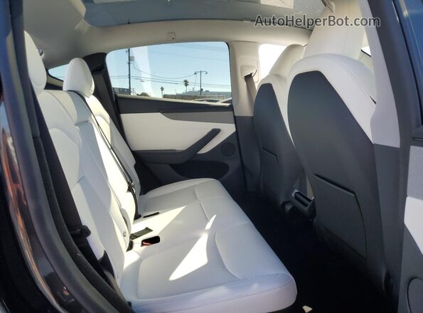 7SAYGDEEXTF408248 2026 TESLA MODEL Charcoal უკანა სალონის ხედი
