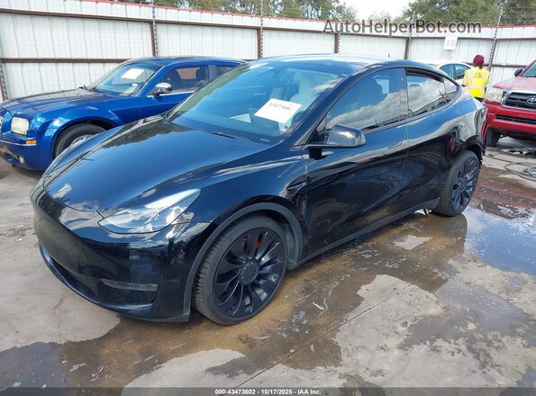 7SAYGDEF1NF456488 2022 TESLA MODEL Y Black Vista tres cuartos delantera izquierda