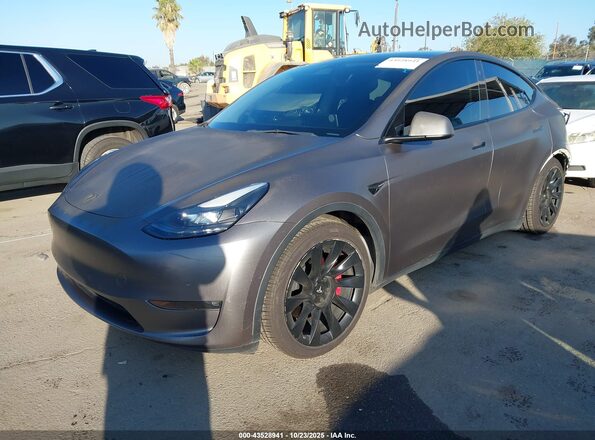 7SAYGDEF6NF511484 2022 TESLA MODEL Y Gray Առջևի ձախ երեք քառորդ տեսարան
