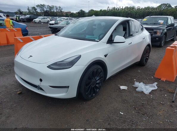 7SAYGDEF6NF516748 2022 TESLA MODEL Y White წინა მარცხენა ხედი სამი მეოთხედიდან