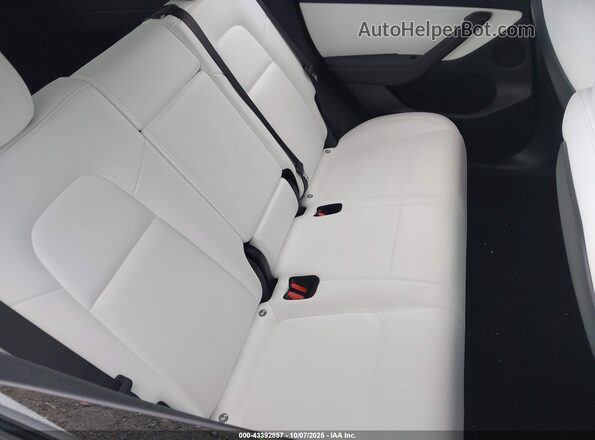 7SAYGDEF6NF516748 2022 TESLA MODEL Y White VIN კოდის სტიკერის ხედი