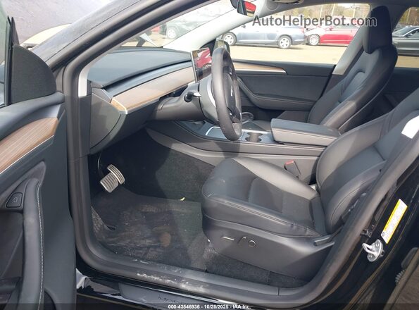 7SAYGDEF6SA351549 2025 TESLA MODEL Y Black Vista interior delantera