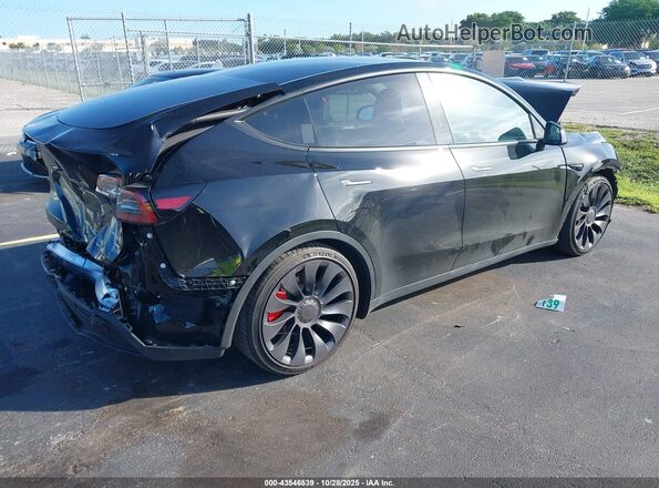 7SAYGDEF7RF042587 2024 TESLA MODEL Y Black 