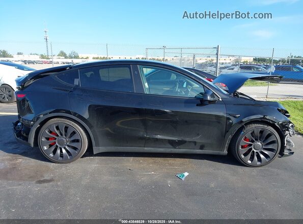 7SAYGDEF7RF042587 2024 TESLA MODEL Y Black 