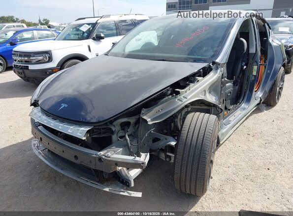7SAYGDEF8RA291235 2024 TESLA MODEL Y Blue Вид спереду