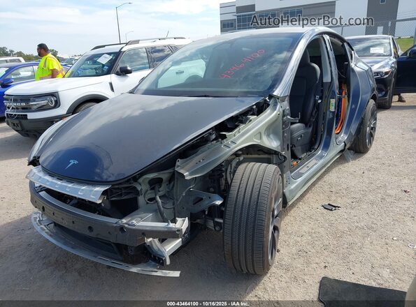7SAYGDEF8RA291235 2024 TESLA MODEL Y Blue Передня ліва чверть