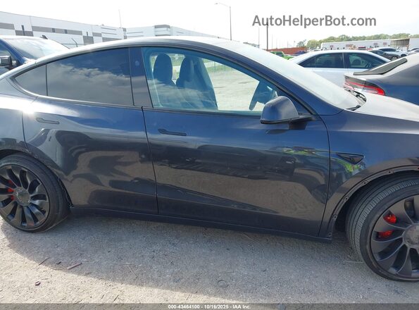 7SAYGDEF8RA291235 2024 TESLA MODEL Y Blue Вид задньої частини салону