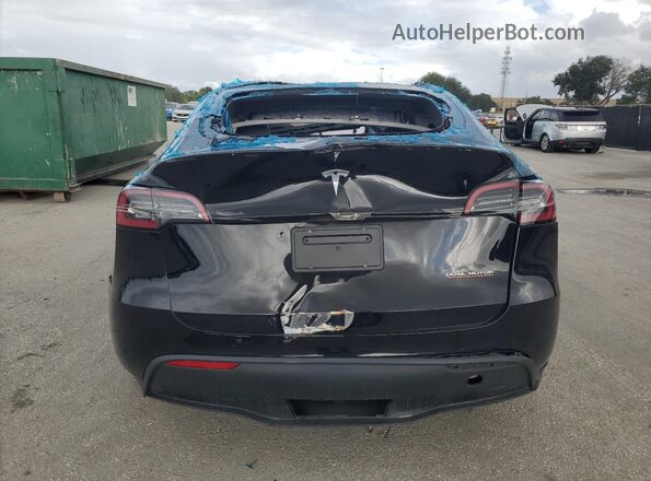 7SAYGDEF8RF041531 2024 TESLA MODEL Y Черный Вид салона спереди