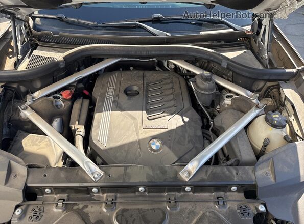 5UXCW2C01L9B07305 2020 BMW X7 White Առջևի վահանակի տեսք
