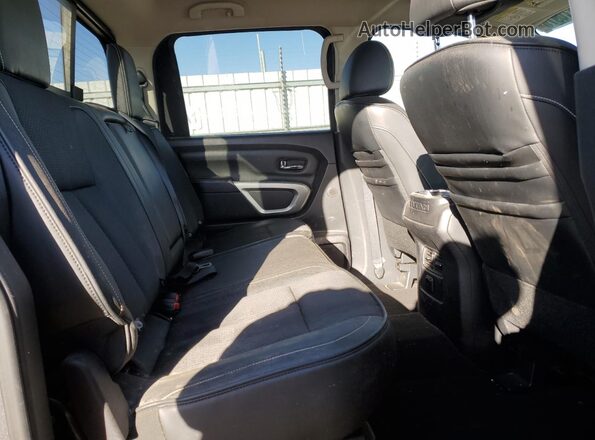 1N6BA1F47GN504254 2016 NISSAN TITAN Gray Widok wnętrza z tyłu