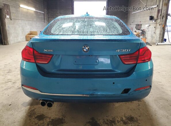WBA4J3C57JBG96076 2018 BMW 4 SERIES Blue Vista interior delantera
