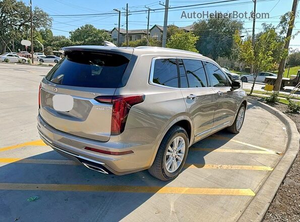1GYKPAR43NZ182063 2022 CADILLAC OTHER Желто-коричневый 