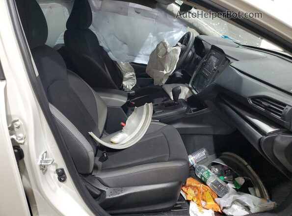 JF1GUABC7S8266285 2025 SUBARU IMPREZA White Front interior view