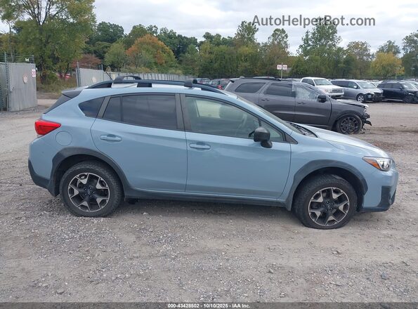 JF2GTAAC7KG217660 2019 SUBARU CROSSTREK Light Blue Вид задней части салона