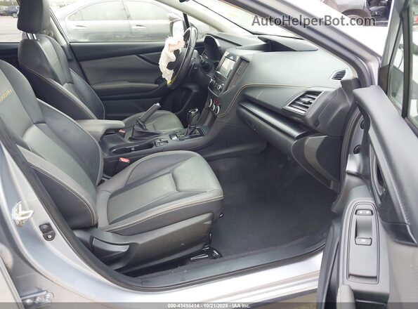JF2GTHRC9MH279023 2021 SUBARU CROSSTREK Silver Front interior view