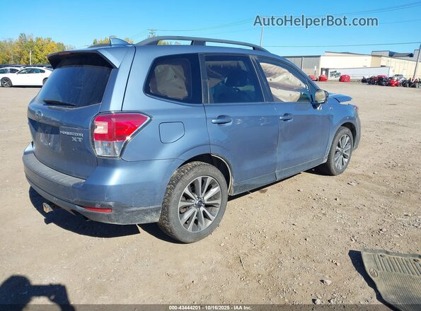 JF2SJGWC1JH528652 2018 SUBARU FORESTER2. Blue Trasero derecho