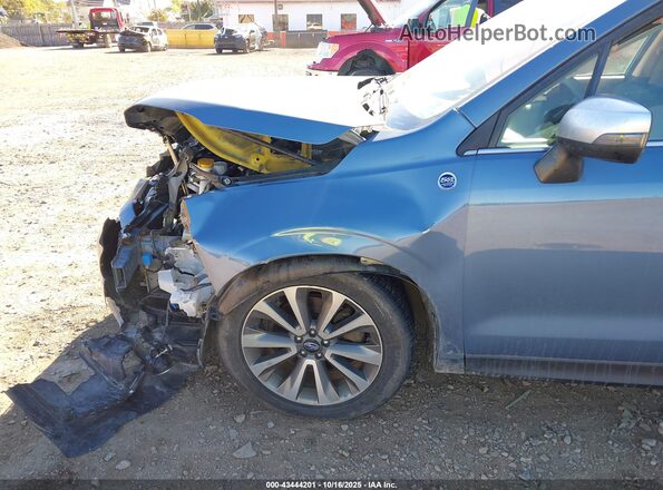 JF2SJGWC1JH528652 2018 SUBARU FORESTER2. Blue Vista frontal