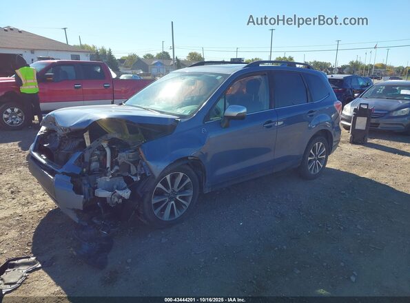 JF2SJGWC1JH528652 2018 SUBARU FORESTER2. Blue Vista tres cuartos delantera izquierda