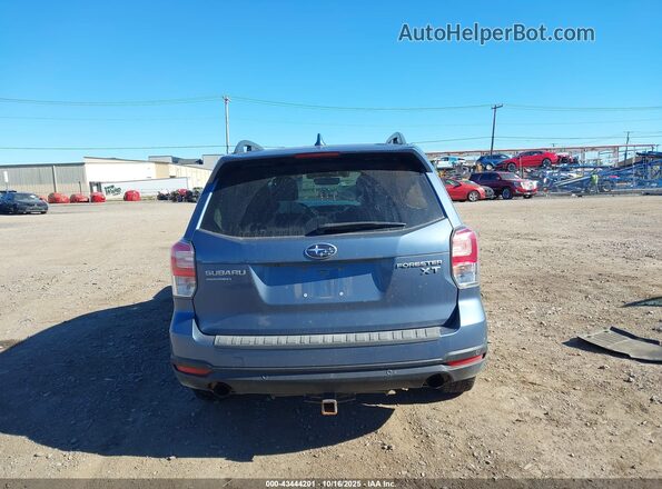 JF2SJGWC1JH528652 2018 SUBARU FORESTER2. Blue 
