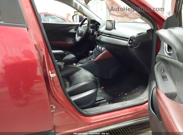 JM1DKFD77H0158031 2017 MAZDA CX-3 Red Widok wnętrza z przodu