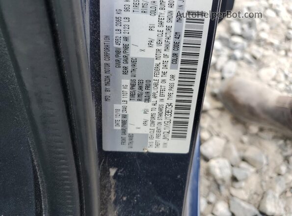 JM1GL1XY9J1336734 2018 MAZDA MAZDA Blue VIN կոդի պիտակի տեսք