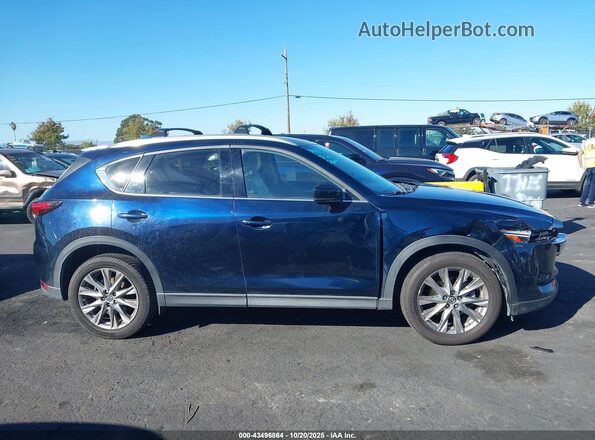 JM3KFBAY6L0772361 2020 MAZDA CX-5 Blue Vista interior trasera