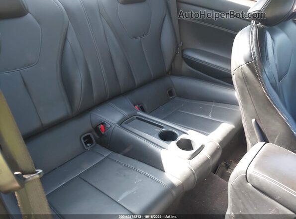 JN1EV7EK9JM340545 2018 INFINITI Q60 White VIN կոդի պիտակի տեսք