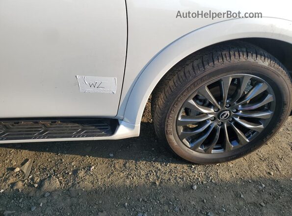 JN8AY2DB7P9833633 2023 NISSAN ARMADA White VIN კოდის სტიკერის ხედი