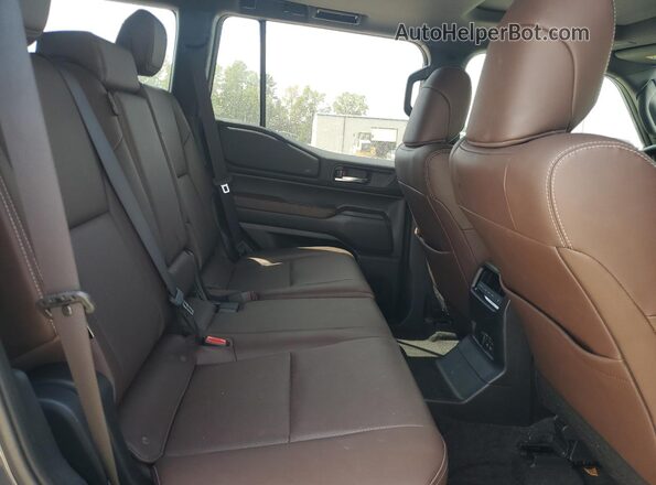 JTEABFAJ7RK010563 2024 TOYOTA LAND Gray Vista interior trasera