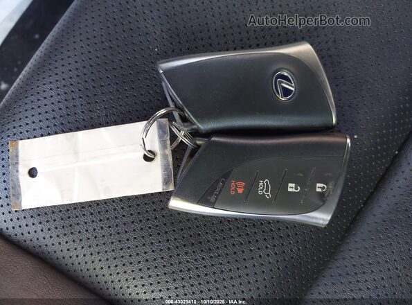 JTHP9JBH6L2027143 2020 LEXUS UX 250H Pewter Вид панели приборов