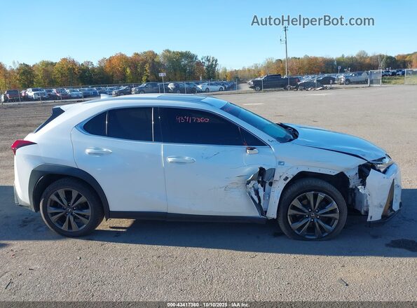 JTHR9JBH3L2021843 2020 LEXUS UX 250H White Vista interior trasera