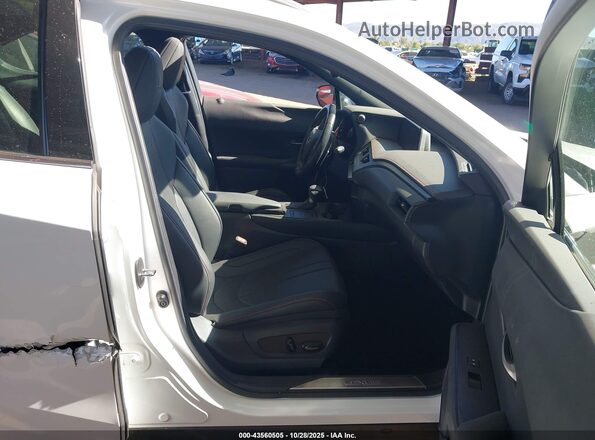 JTHU9JBH3K2003707 2019 LEXUS UX 250H White Vista interior delantera