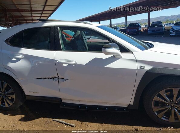 JTHU9JBH3K2003707 2019 LEXUS UX 250H White Vista interior trasera