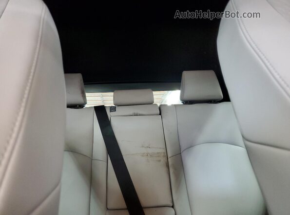JTHY3JBH9K2017081 2019 LEXUS UX White Vista de los asientos traseros
