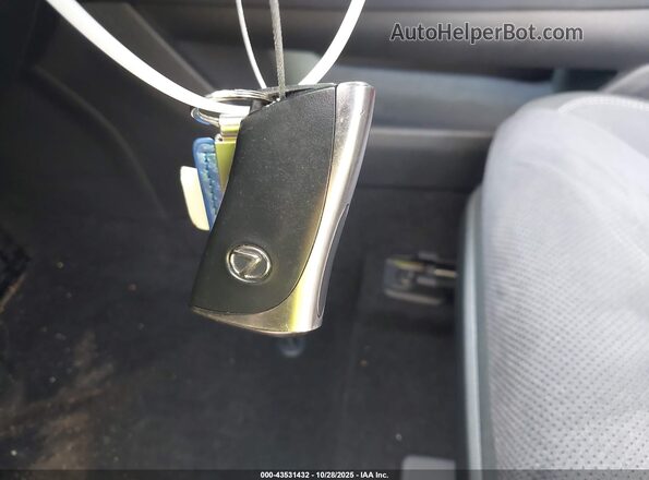 JTJAAAAB7PA012204 2023 LEXUS RZ 450E Серебряный Вид панели приборов