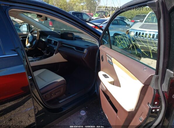 JTJDZKCA5J2008475 2018 LEXUS RX 350L Black Front interior view
