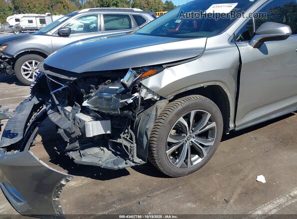 JTJHGKFA8L2014163 2020 LEXUS RX 450HL Gold Դիմացի տեսք