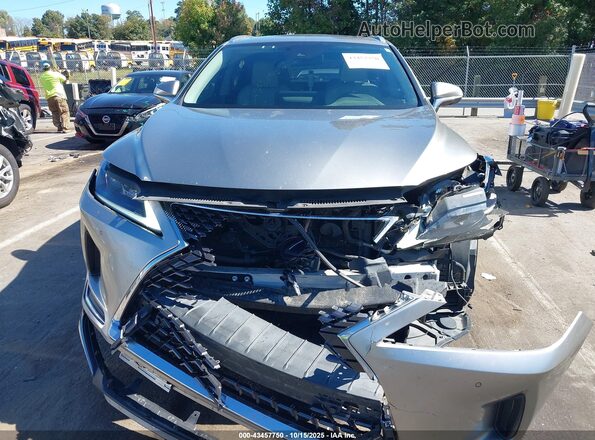 JTJHGKFA8L2014163 2020 LEXUS RX 450HL Gold Սալոնի հետևի տեսք
