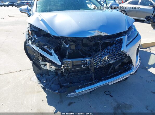 JTJHZKEAXN2024921 2022 LEXUS RX 350L Серебряный Вид спереди
